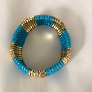 Turquoise colored stretch bracelet. Makes a great Xmas gift.